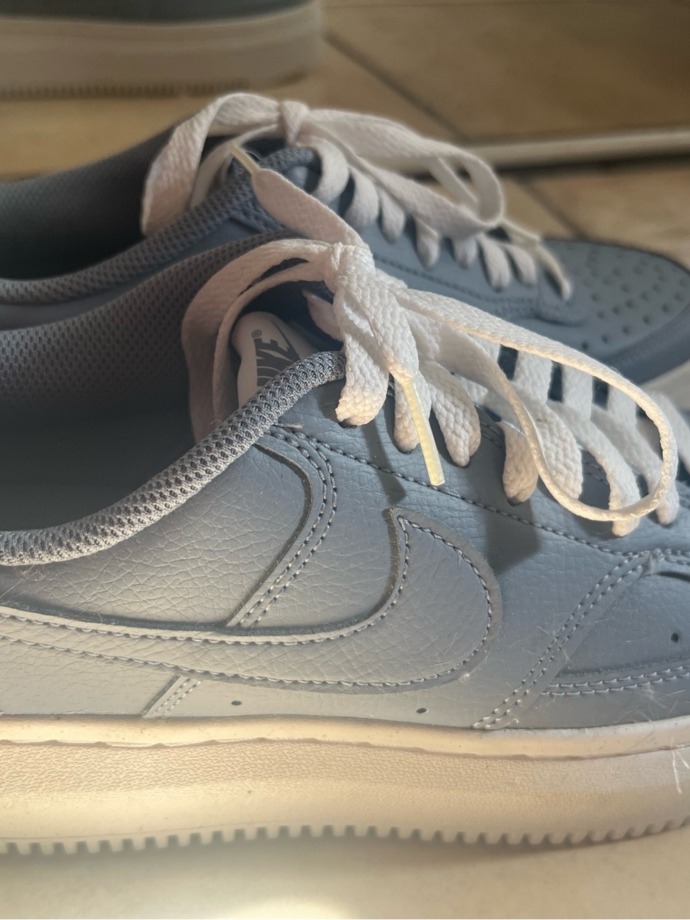 Nike Low-Top Sneakers in Light Blue and White